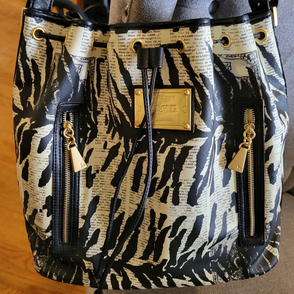 L.A.M.B by Gwen Stefani broadgate Mandalay newsprint zebra drawstring tote